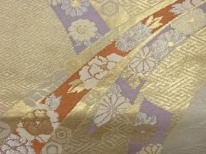アンティーク　熨斗に草花・古典柄模様織出し名古屋帯